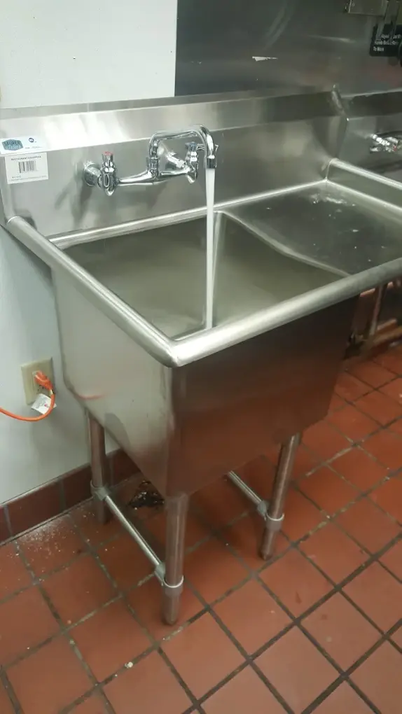 Commercial three-basin stainless steel dish wash station